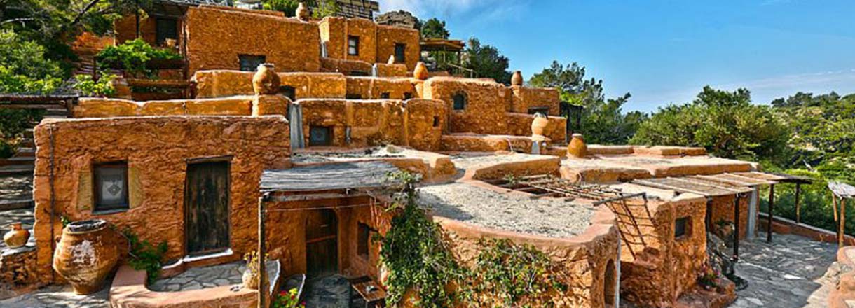 Heraklion Airport transfer to Aspros Potamos Makry Gialos traditional stone houses